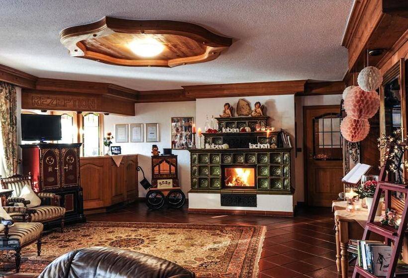 ホテル Vierjahreszeiten