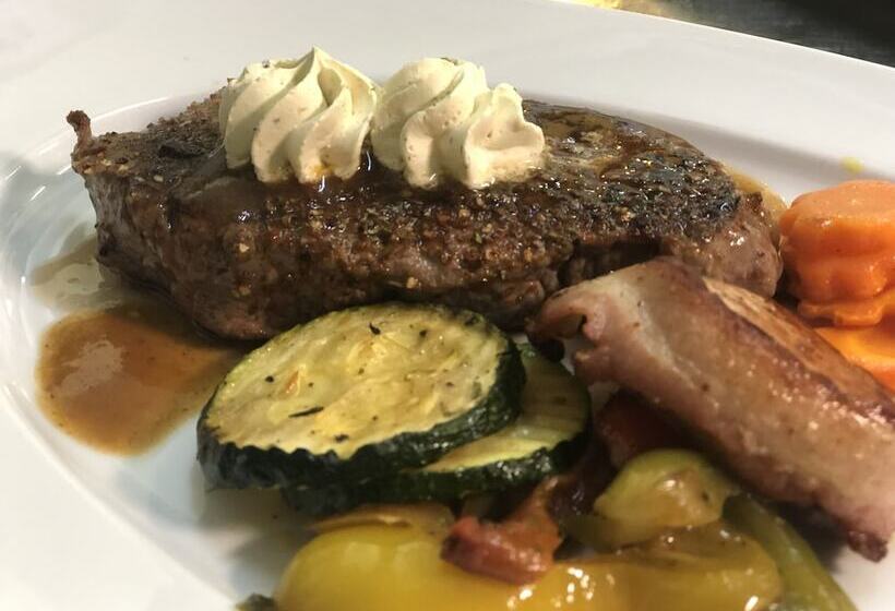 ホテル Vierjahreszeiten