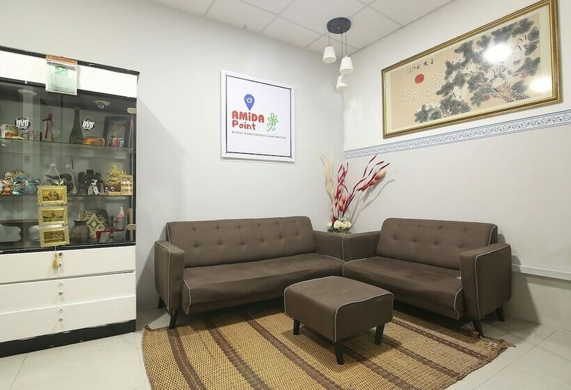 호텔 Spot On 90044 Amida Point