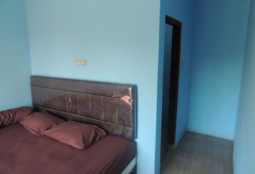 בית מלון כפרי Penginapan Pratama