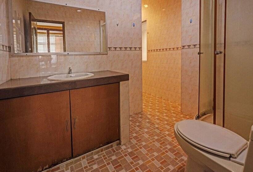 Отель Collection O 91484 Lai Lai Apartment