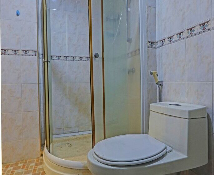 Отель Collection O 91484 Lai Lai Apartment