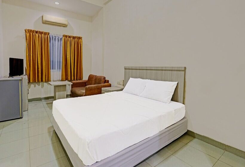 Отель Collection O 91484 Lai Lai Apartment