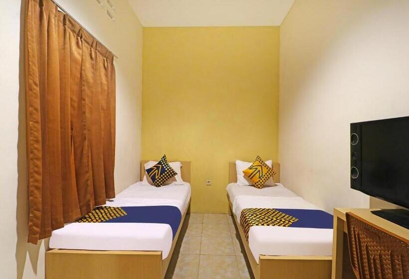 ホテル Spot On 91504 De Vila Ungu Syariah