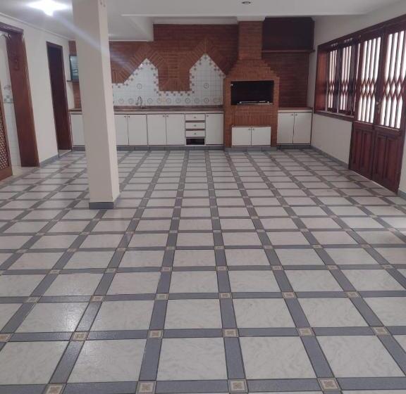 بنسيون Acomodações Anfitriã