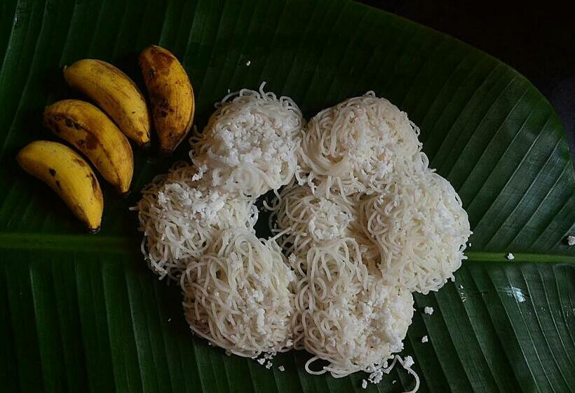 펜션 Mullavayalil Tourist Home