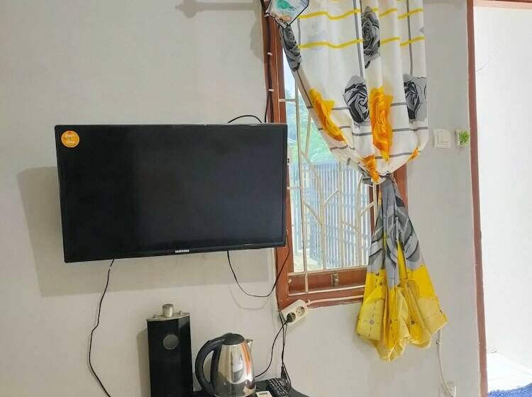 호텔 Express O 91277 Atiq Homestay Syariah