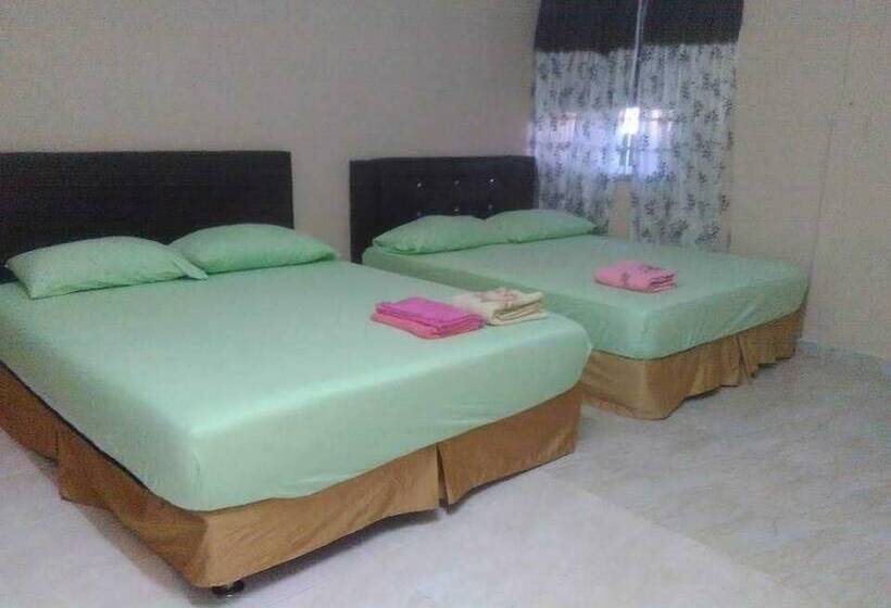 בית מלון כפרי Oyo Homes 90600 Ummi Chalet Dungun