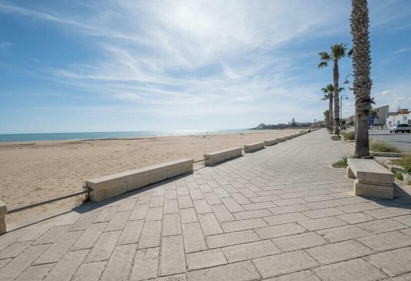 Donna Beatrice Amare Beach House