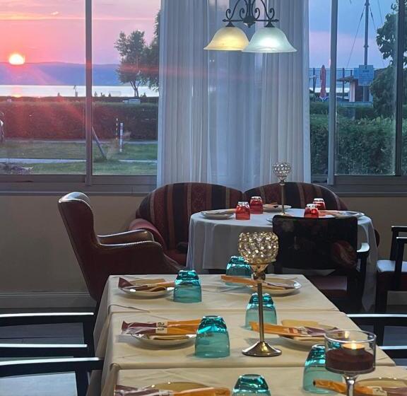 Отель Al Faro Lodge Am See