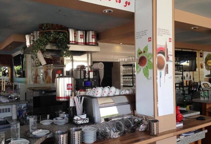 Отель Al Faro Lodge Am See