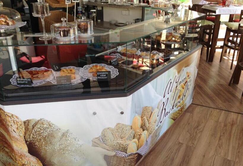 Отель Al Faro Lodge Am See