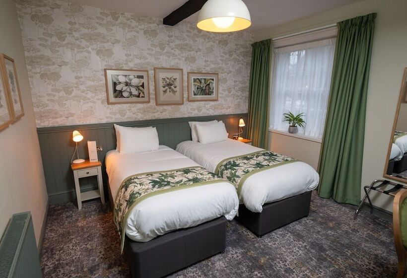 בית מלון כפרי Rockingham Arms By Greene King Inns