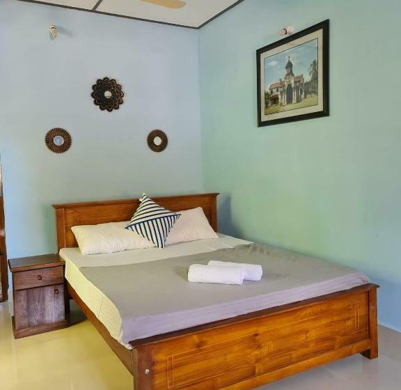 Bed and Breakfast Nalluran Illam Family Room