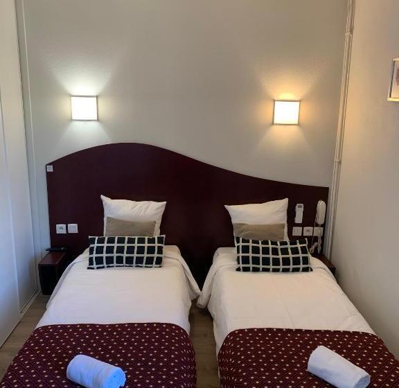 Отель Les Commercants