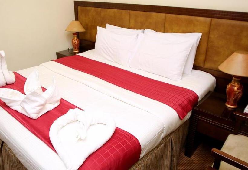 בית מלון כפרי Rawabi Al Zahrah