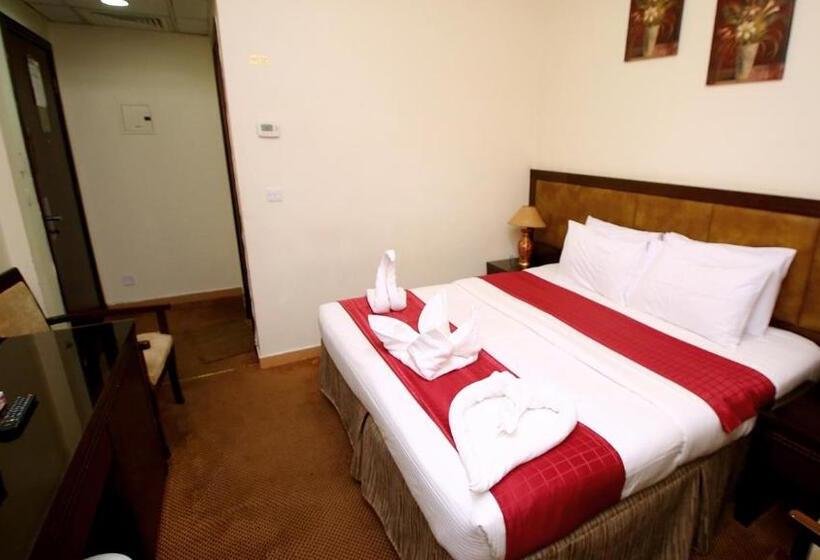 בית מלון כפרי Rawabi Al Zahrah