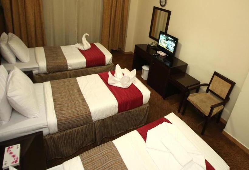 בית מלון כפרי Rawabi Al Zahrah