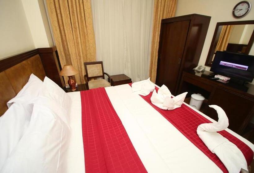 בית מלון כפרי Rawabi Al Zahrah