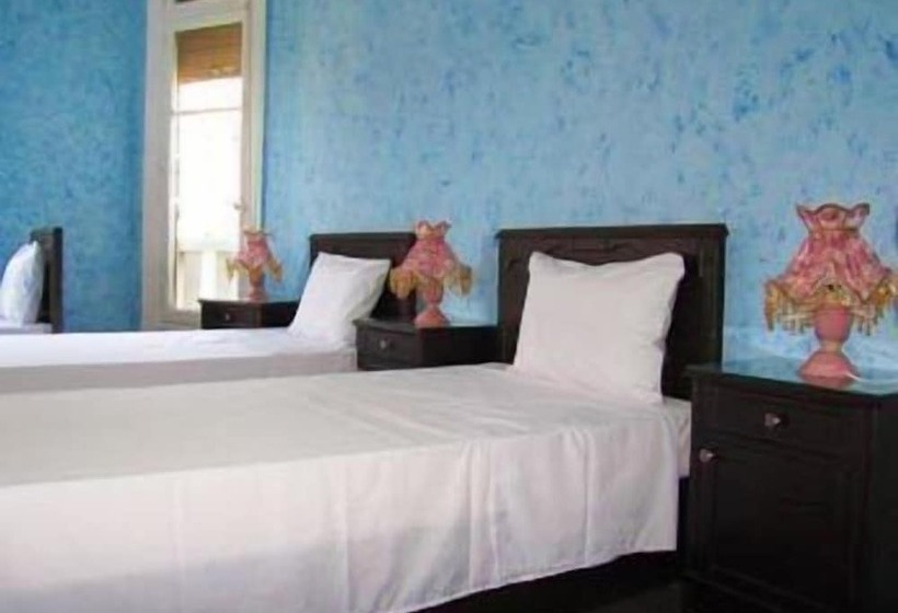 هتل Travelers House