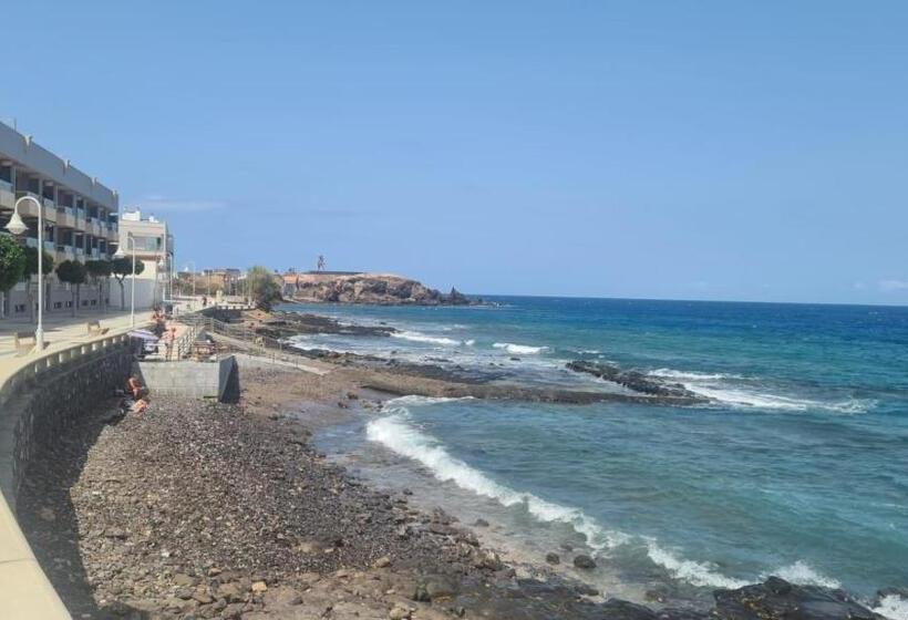 Arinaga Arena Y Mar Beach