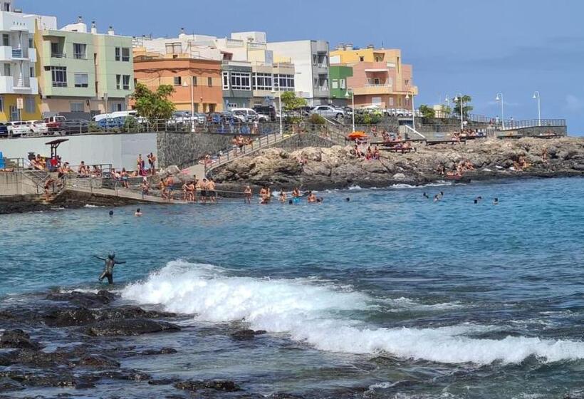 Arinaga Arena Y Mar Beach