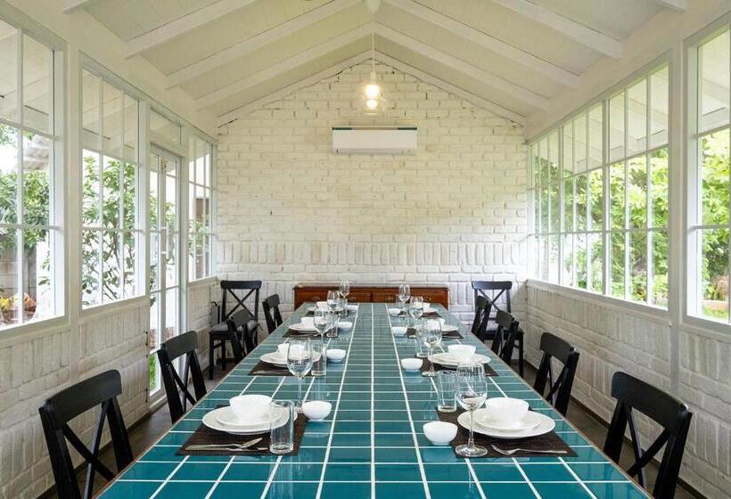 Stayvista S Villaggio   Orchard Oasis With Pool, Expansive Lawn, Patio & Indoor Activities