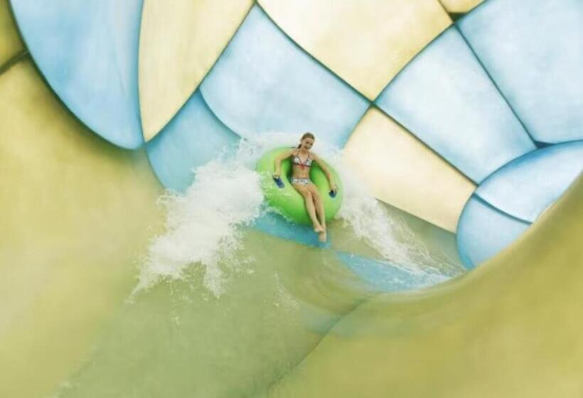 Green Tiny House With Shared Pool