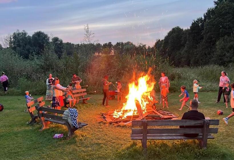 Green Tiny House With Shared Pool