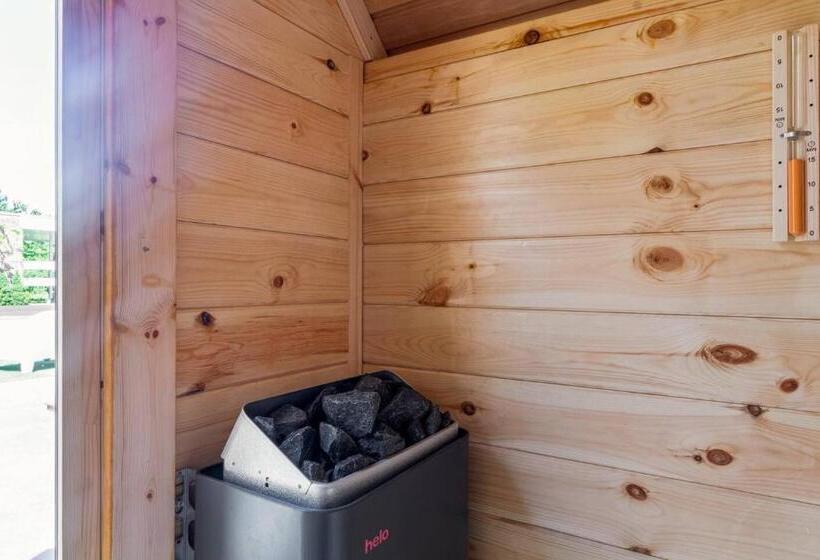 Green Tiny House With Shared Pool