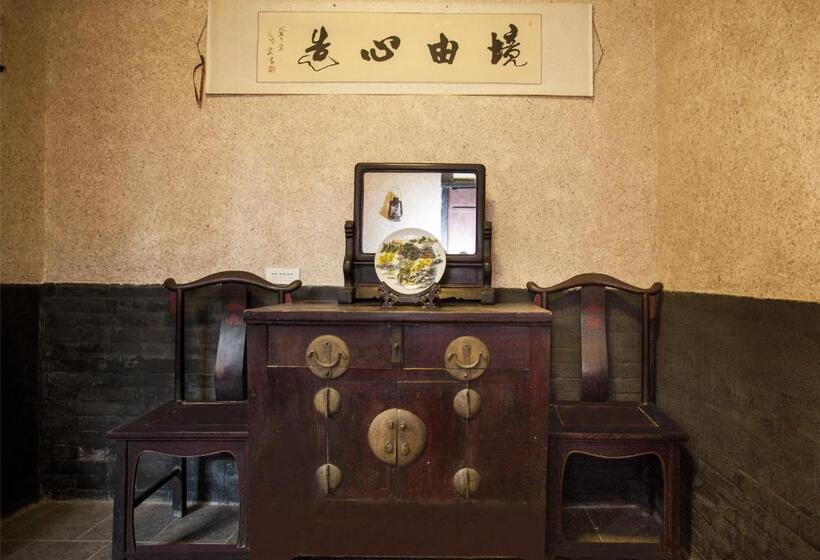 Отель Pingyao Ji Family Courtyard Inn