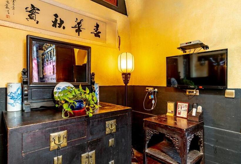 Отель Pingyao Ji Family Courtyard Inn