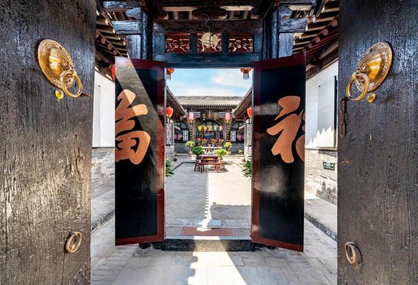 Отель Pingyao Ji Family Courtyard Inn