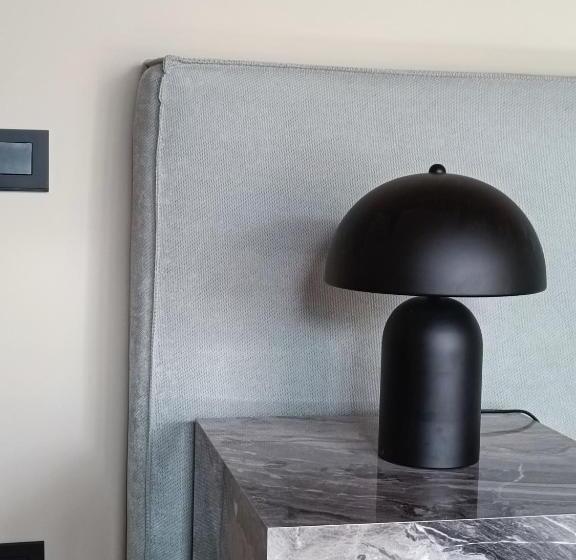 Отель Hôtel Les Suites Du Maquis