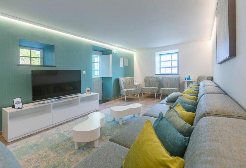 Отель Abrigo Da Cascata Casas De Campo São Jorge