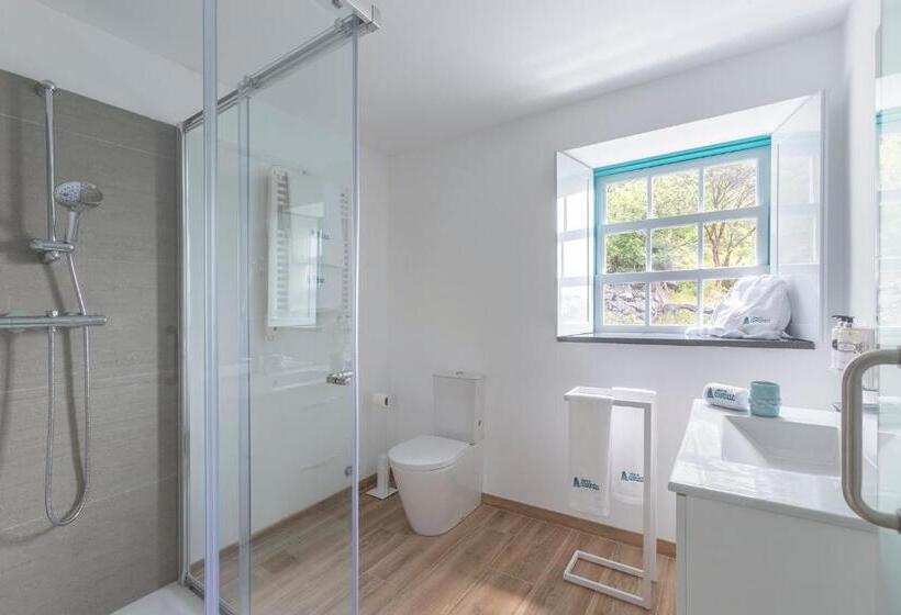 Отель Abrigo Da Cascata Casas De Campo São Jorge