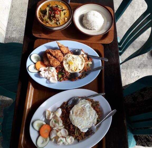 הוסטל Rinjani Houseboon