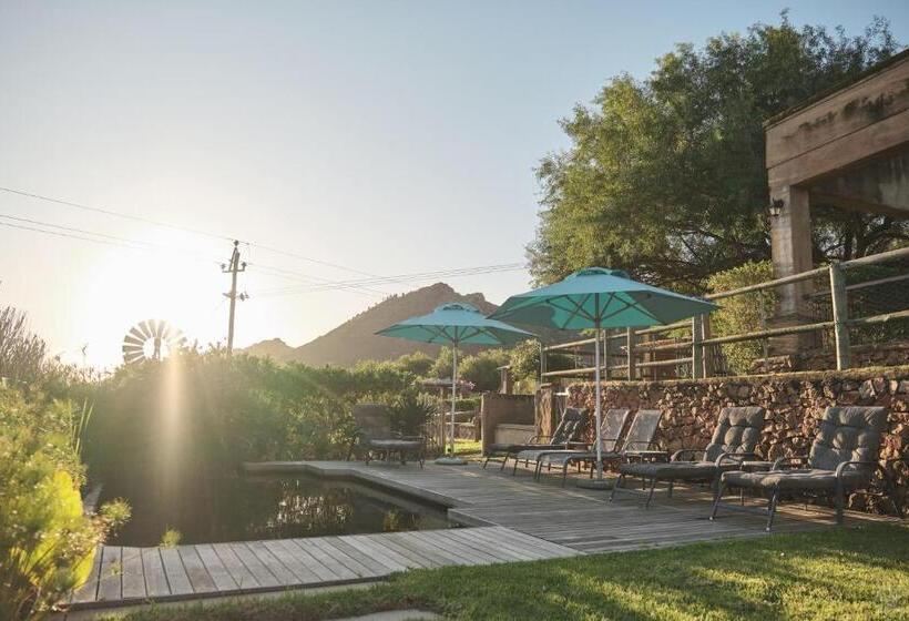 هتل Heuwelsig Cottages