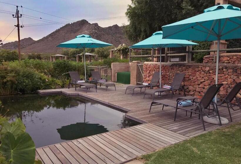 هتل Heuwelsig Cottages