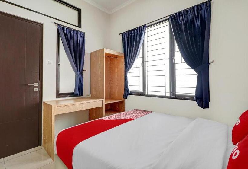 هتل Oyo 90688 Marta Residence