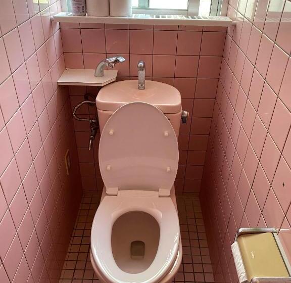 بنسيون ゲストハウス喜舎場