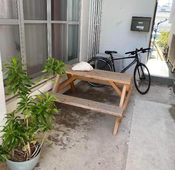 بنسيون ゲストハウス喜舎場