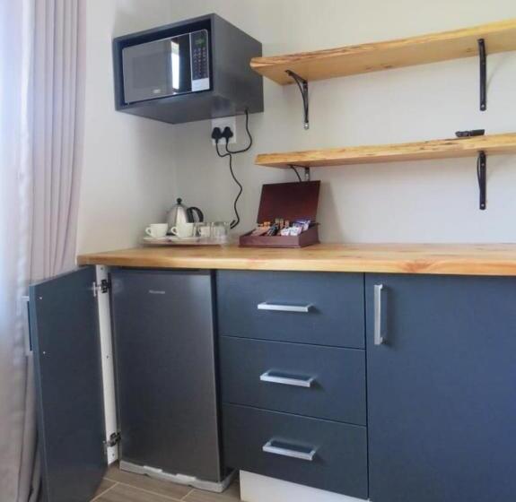 פנסיון Sani Pass Manor Guest House