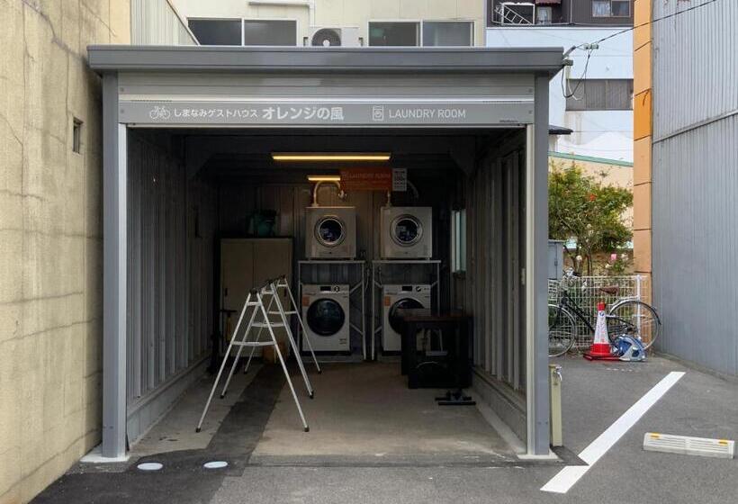 Pension (Hôtel basse catégorie) オレンジの風