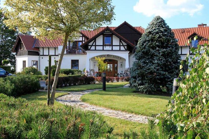 Отель Dworek Nad Regą