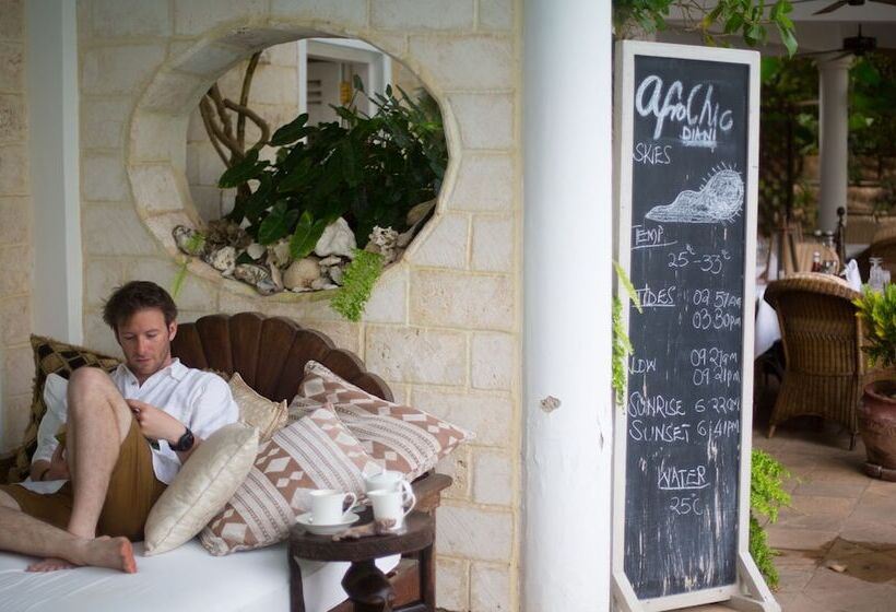 בית מלון כפרי Elewana Afrochic Diani Beach