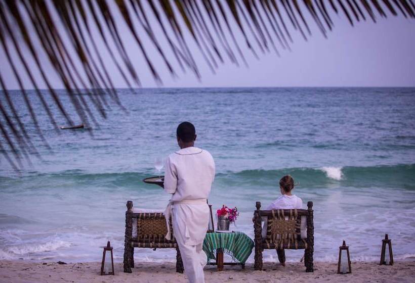 בית מלון כפרי Elewana Afrochic Diani Beach