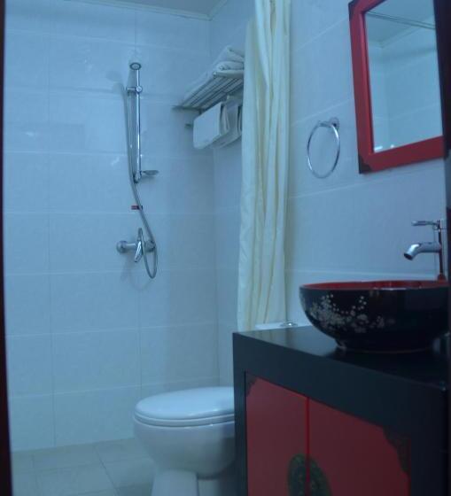 Отель Qianmen Courtyard