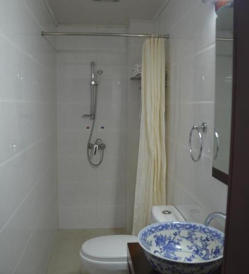 Отель Qianmen Courtyard