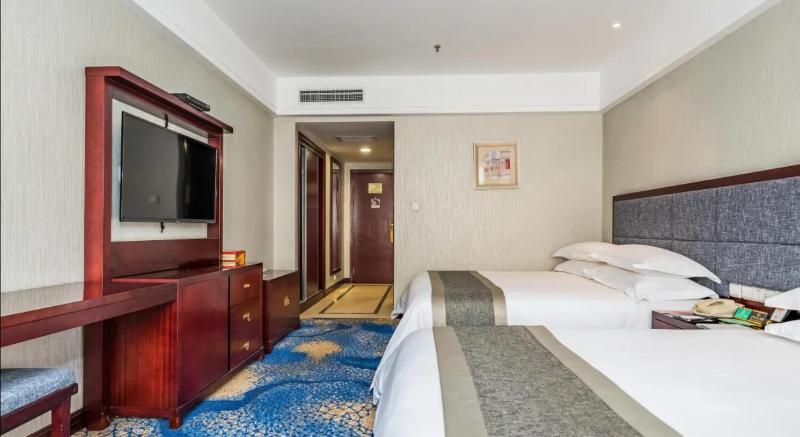 فندق Enshi International